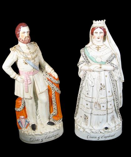 Appraisal: Pair of Staffordshire figures modeled after The Queen of England