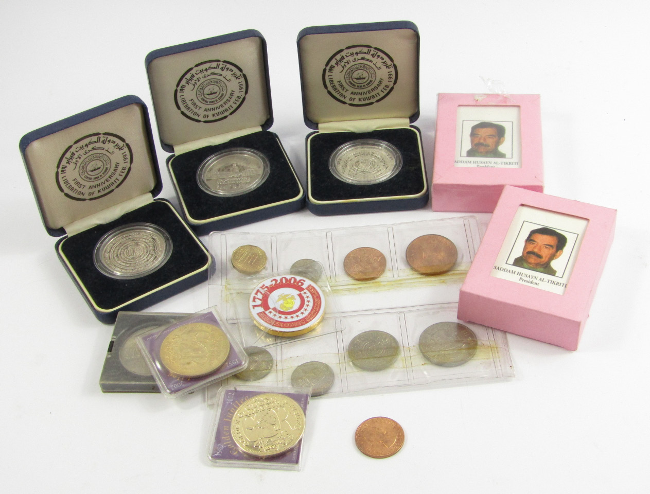 Appraisal: Three Liberation of Kuwait First Anniversary medallions two Queen Elizabeth