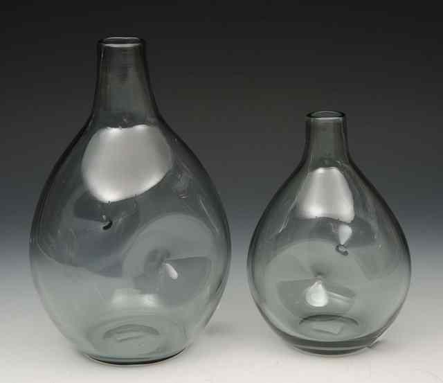 Appraisal: Ronald Stennett-Wilson for BjorkshultTwo smoky grey glass bottle vases designed