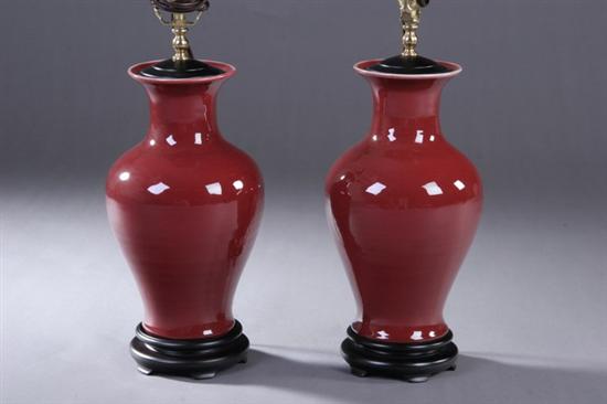 Appraisal: PAIR CHINESE COPPER RED PORCELAIN VASES Electrified - in high