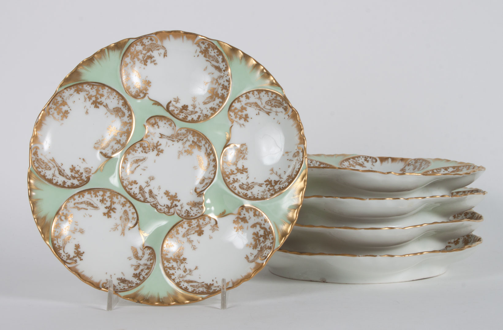 Appraisal: Five Limoges porcelain oyster plates late th century six pocket