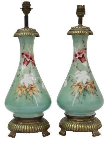 Appraisal: pair French porcelain oil lamps late th c now electrified