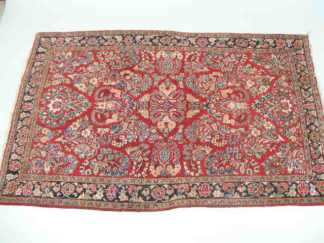 Appraisal: Semi-Antique Persian Sarouk Area Rug red ground hand knotted and