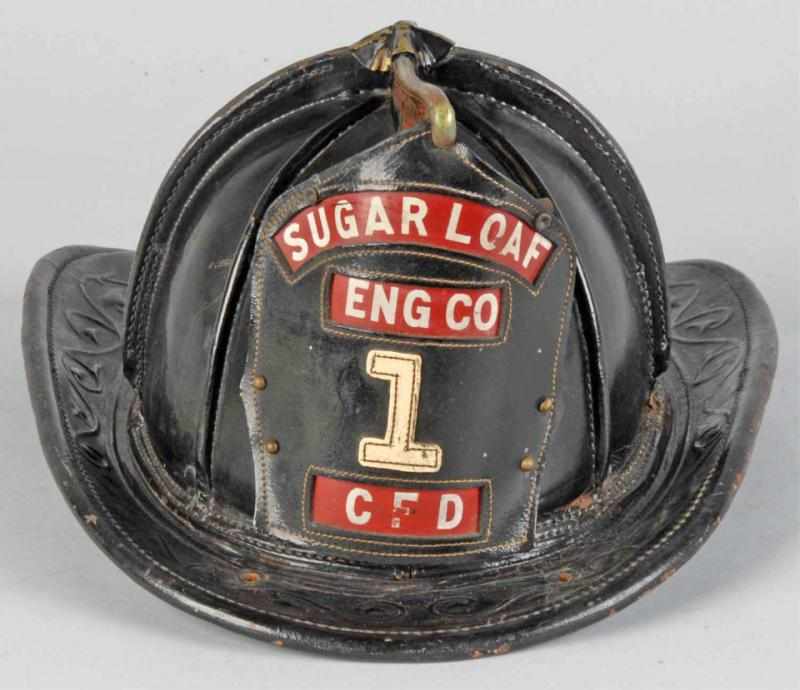 Appraisal: Leather Fireman's Helmet Description Sugarloaf Engine Company Condition Excellent Size