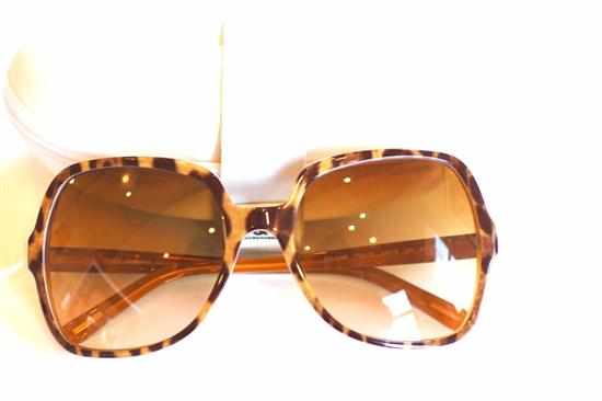 Appraisal: A PAIR OF FAUX TORTOISESHELL SUNGLASSES BY DOLCE AND GABBANA