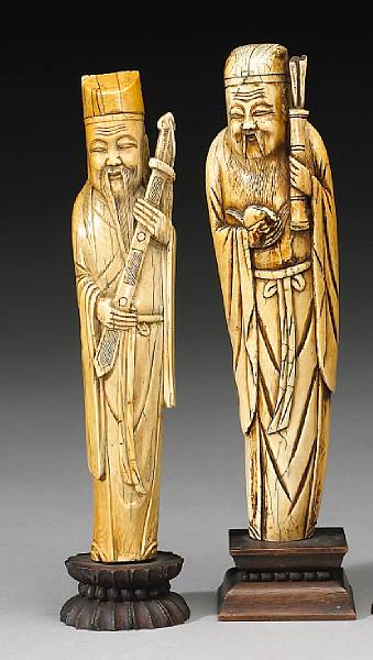 Appraisal: A group of two tinted ivory Daoist immortals th Century