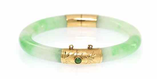 Appraisal: A Chinese Jade Bangle with Karat Yellow Gold Fittings the