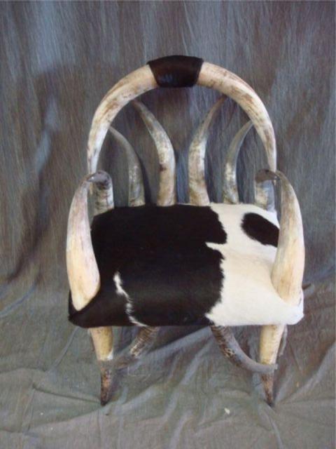 Appraisal: Horn Cowhide Chair Dimensions x x