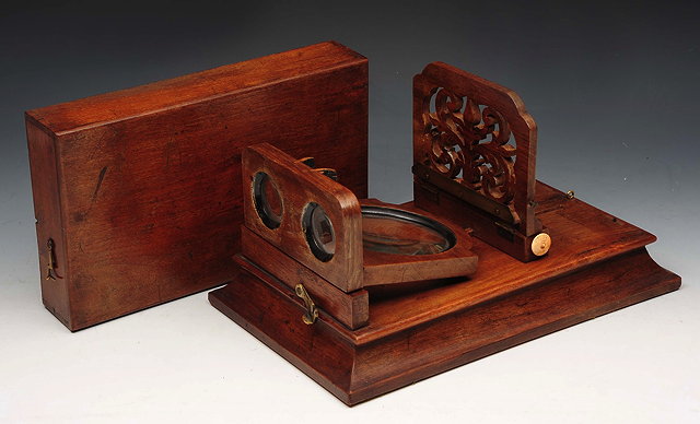 Appraisal: A VICTORIAN MAHOGANY CASED STEREOSCOPIC VIEWER with folding interior cm