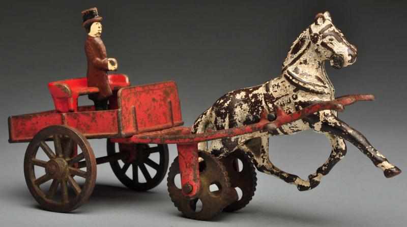 Appraisal: Cast Iron Carpenter Dr 's Cart Horse-Drawn Toy Description American