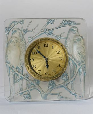 Appraisal: Inseparables' No a Lalique blue stained opalescent glass clock designed