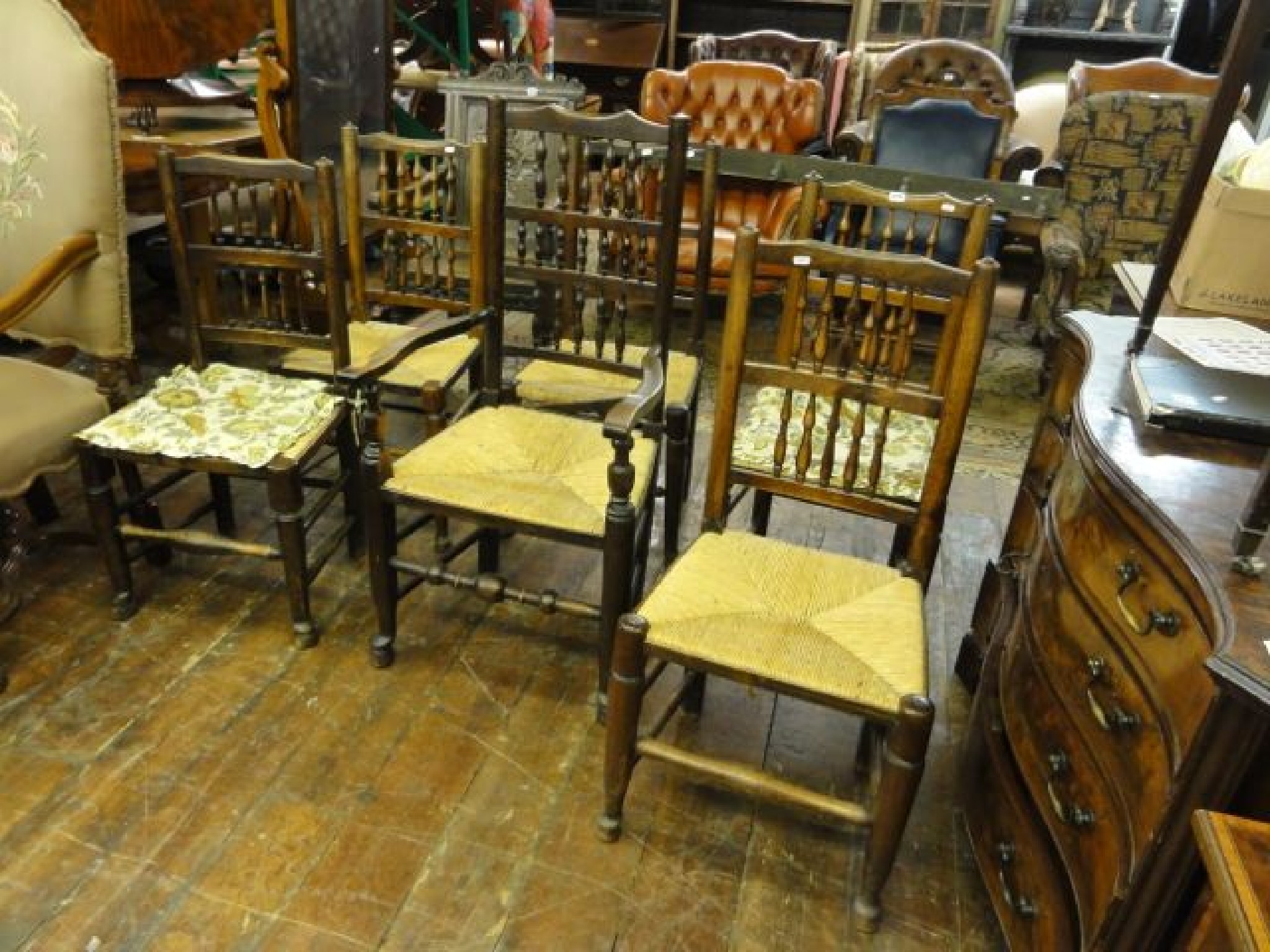 Appraisal: A harlequin set of six ashwood spindle back dining chairs