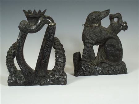 Appraisal: A pair of th century Irish bog oak carved book