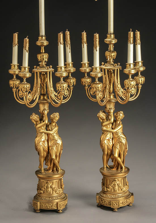 Appraisal: Pair of Louis XV Style Ormolu Figural Six-Light Candelabra Early