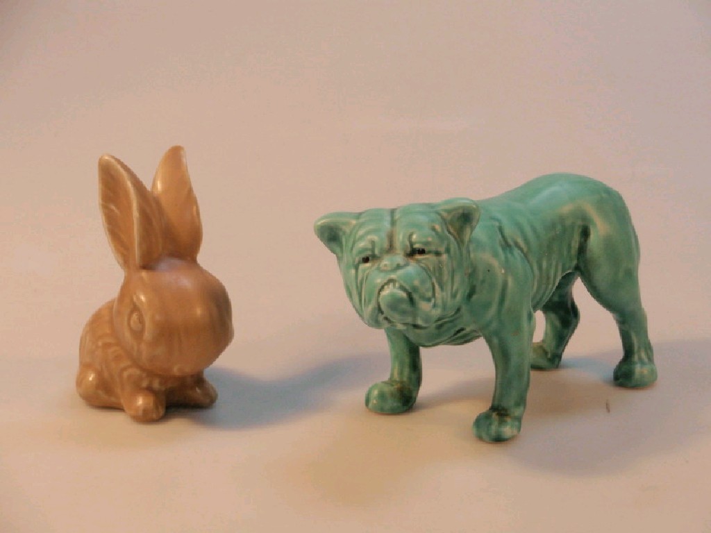 Appraisal: An unmarked Sylvac turquoise glaze British Bulldog cm high together