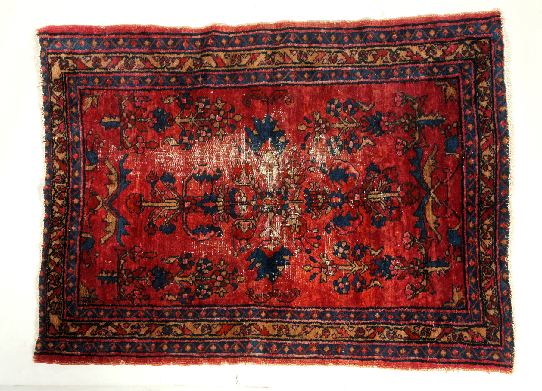 Appraisal: ORIENTAL RUG Ca Lilihan Floral on a red ground '