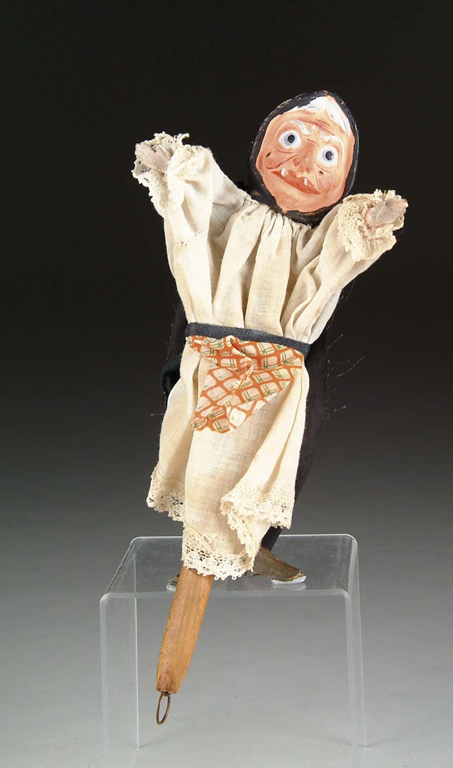 Appraisal: ANIMATED WITCH FIGURE Carved wood and composition figure with cloth