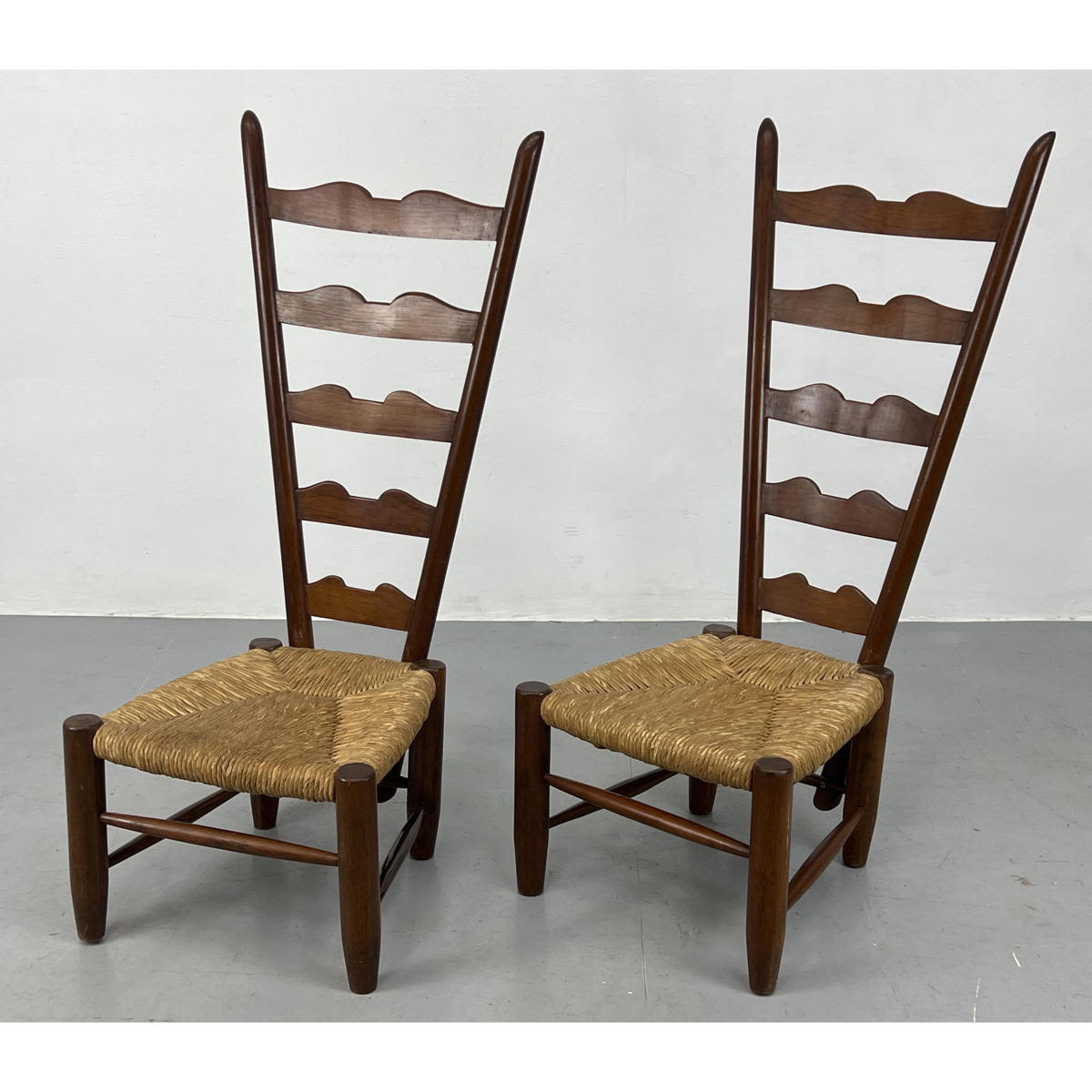 Appraisal: Pr GIO PONTI Fireside Ladder Back Chairs Woven Rush Seats