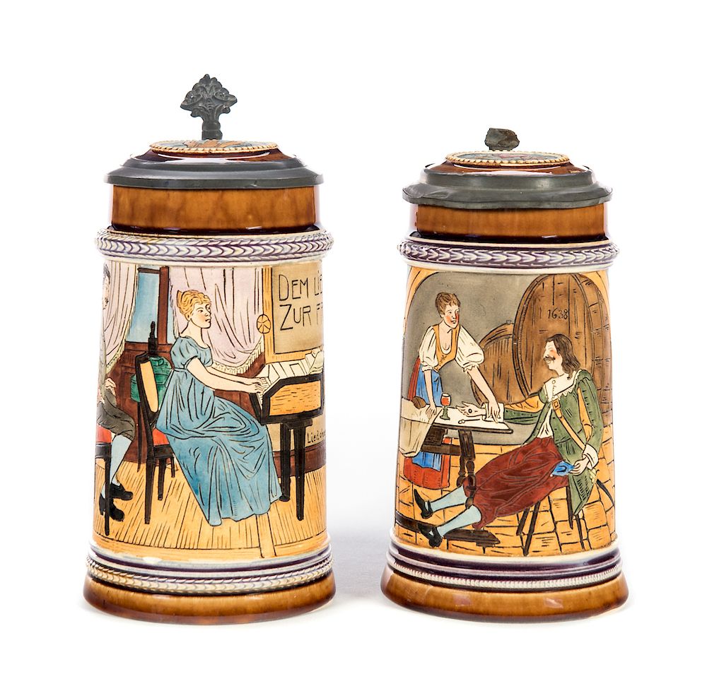 Appraisal: German Incised Interior Scene Steins Excellent condition with no damage