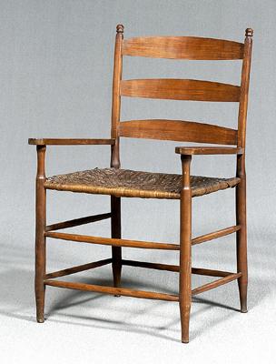 Appraisal: Walnut ladder back armchair bent back riven slats oak split