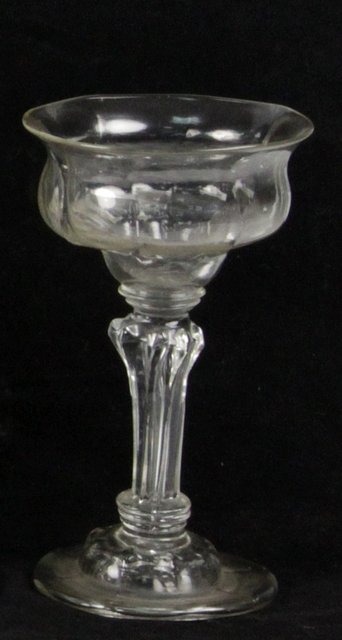 Appraisal: An th Century sweetmeat glass with octafoil bowl on a