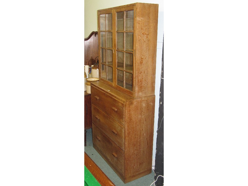 Appraisal: Heals style bookcase on chest