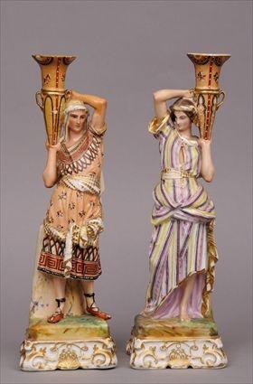 Appraisal: PAIR OF FRENCH GILT AND POLYCHROME DECORATED PORCELAIN CANDLESTICKS WITH