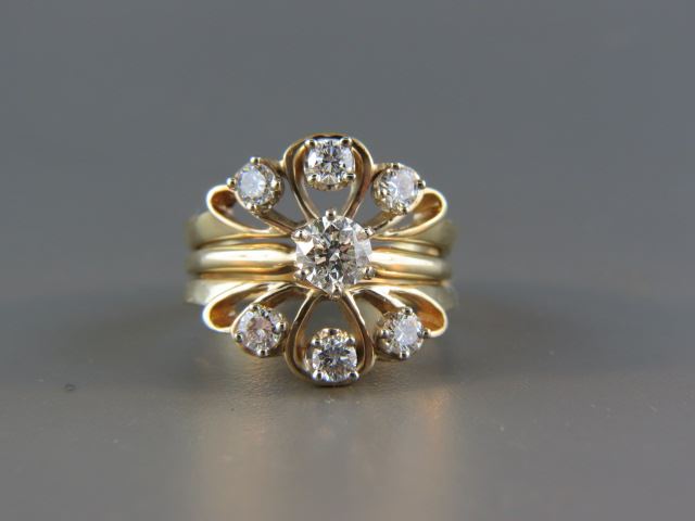 Appraisal: Diamond Ring carat round brilliant with six smaller diamonds totaling