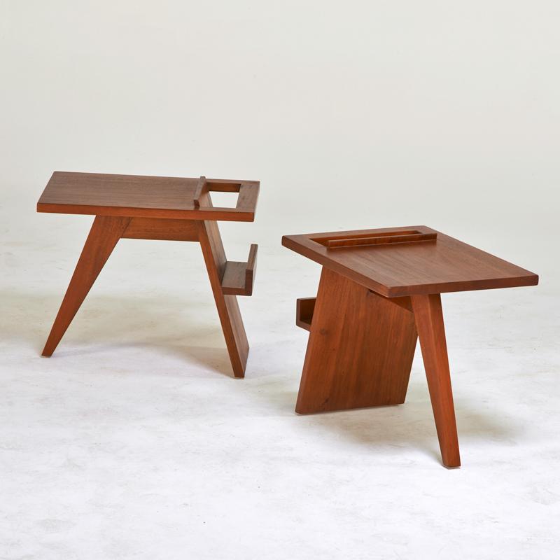 Appraisal: STYLE OF JENS RISOM Pair of magazine tables Teak Unmarked