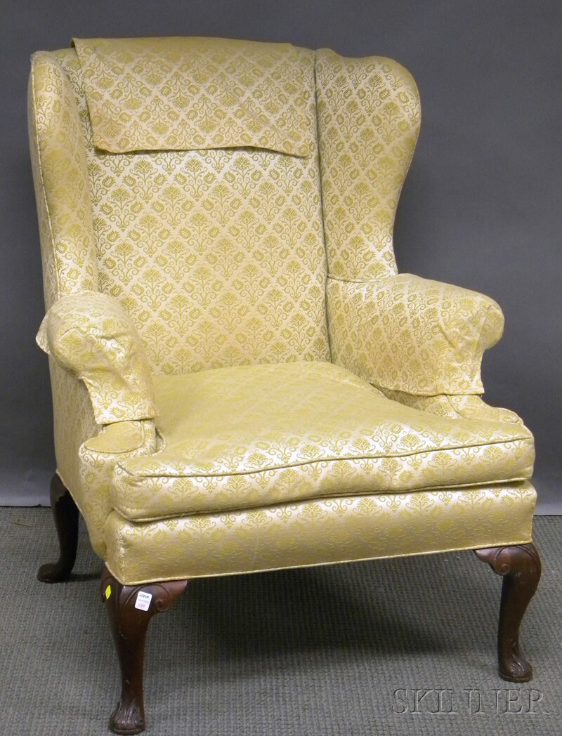 Appraisal: Queen Anne-style Upholstered Carved Mahogany Wing Chair