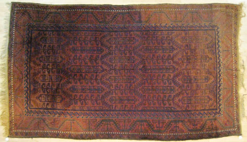 Appraisal: Turkoman carpet ca with repeating geometrics on a red field