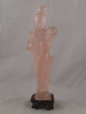 Appraisal: A carved pink hardstone figure of a Chinese lady with