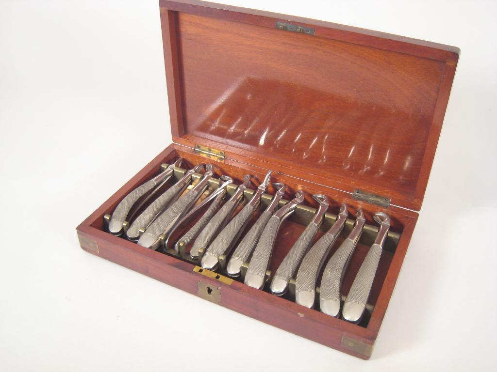 Appraisal: A set of one dozed stainless Dental Pliers with chequered