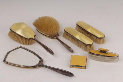 Appraisal: A silver and yellow enamel dressing table set Birmingham comprising