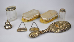 Appraisal: Pair of silver backed hairbrushes two toilet jars with silver