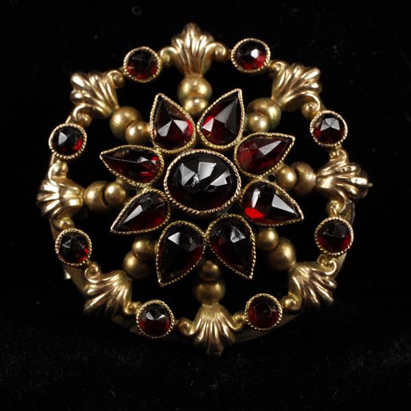 Appraisal: Victorian unmarked gold garnet Brooch Pin dwt dia Replaced clasp