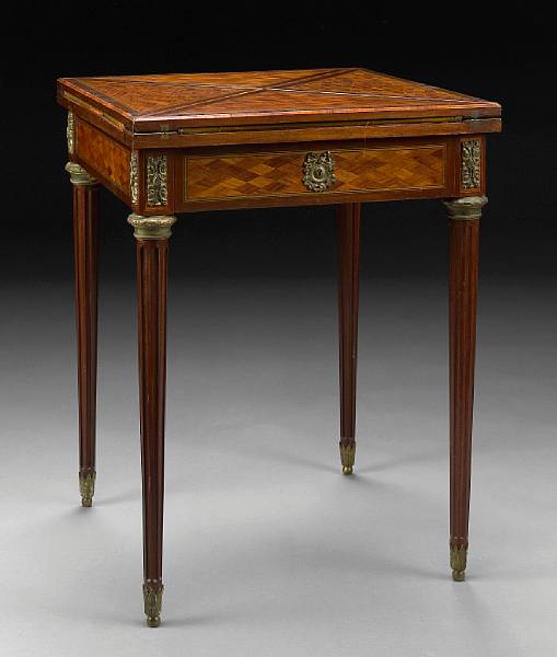 Appraisal: A Louis XVI style gilt bronze mounted parquetry table th