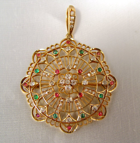 Appraisal: K VICTORIAN DIAMOND AND COLORED STONE BROOCH Pendant brooch contains