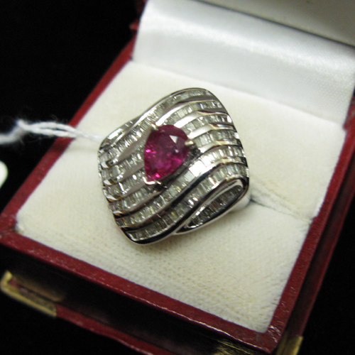 Appraisal: RUBY DIAMOND AND FOURTEEN KARAT WHITE GOLD RING A single