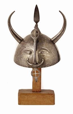 Appraisal: An Indian kulah khud helmet with gilt and silver panelled