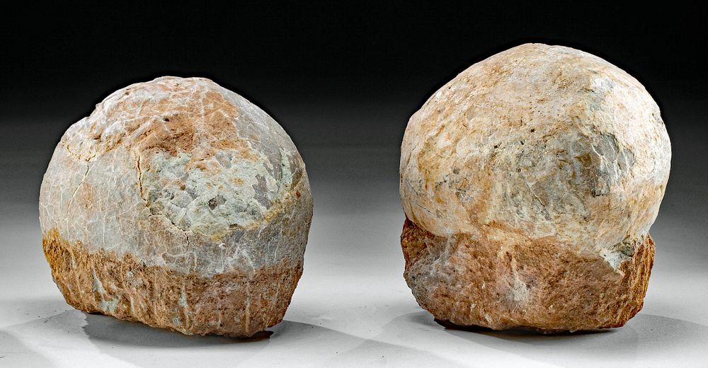 Appraisal: Pair of Fossilized Hadrosauridae Dinosaur Eggs Eastern Asia China Henan