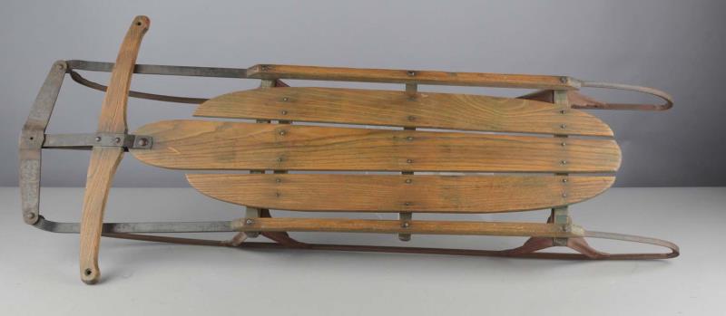 Appraisal: Early Wood And Metal Snow Sled Wood slats with steel