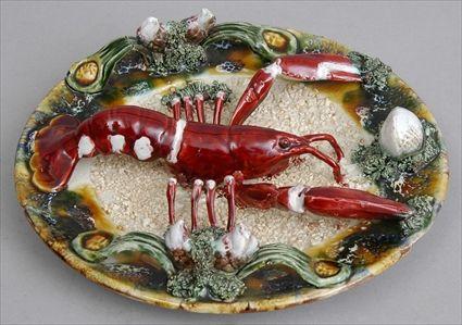 Appraisal: MAJOLICA LOBSTER PLATE Realistically modeled with the lobster on sandy