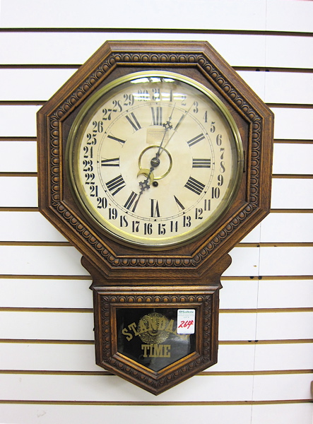 Appraisal: AN OAK SCHOOLHOUSE CALENDAR REGULATOR WALL CLOCK W L Gilbert