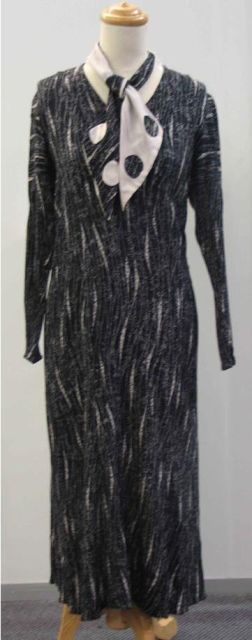 Appraisal: Two s afternoon dresses in abstract printed navy and white