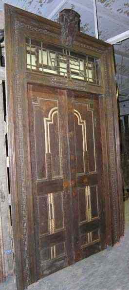 Appraisal: An Indian Art Deco Teak Double Door circa with transom