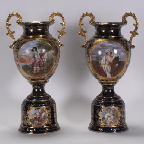 Appraisal: Pair of Sevres style European porcelain handled urns on pedestals