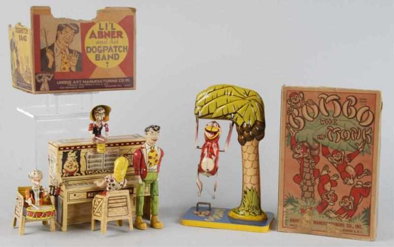 Appraisal: Lot of Tin Litho Unique Art Wind-Up Toys Description American