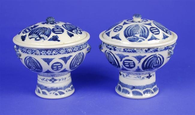 Appraisal: TWO SIMILAR CHINESE BLUE AND WHITE COVERED FOOTED SERVING BOWLS