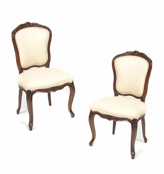 Appraisal: A pair of Louis XV style walnut side chairs height